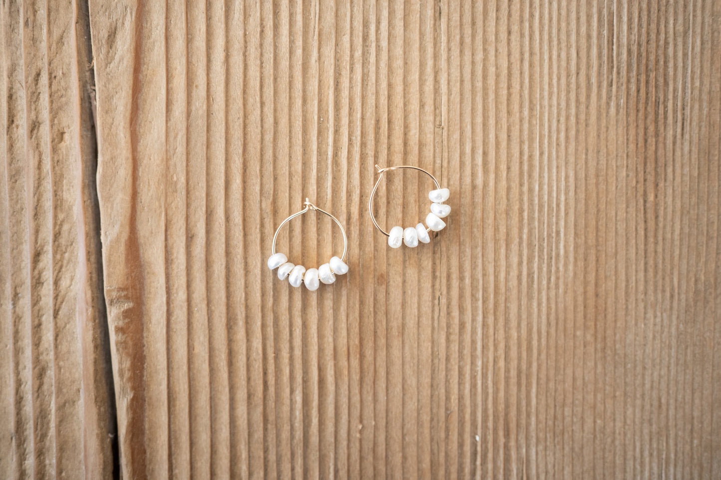pearl earrings.